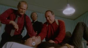 The wet work team try to re-erase Kellen O’Reilly (Michael Ironside)'s memory in Jean-Claude Lord's Mindfield (1989)