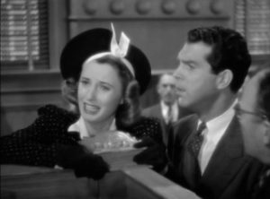 Lee (Barbara Stanwyck) insists on taking full responsibility for her crime despite John (Fred MacMurray)'s efforts to protect her in Mitchell Leisen's Remember the Night (1940)