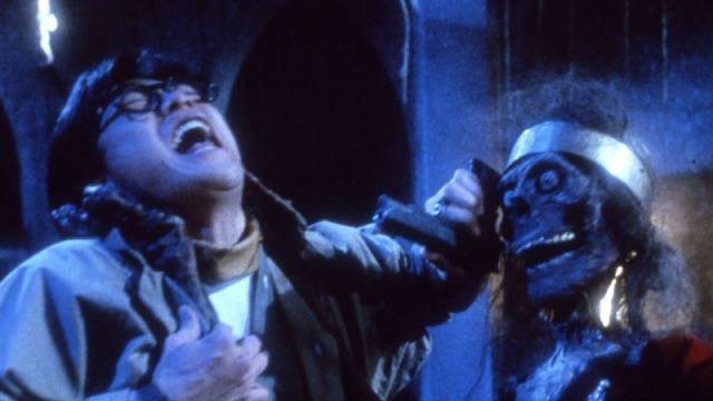 Archaeologist Dr. Yuan (Chin Sui-ho) encounters a remote tribe's god in Lam Ngai-Choi made The Seventh Curse (1986)