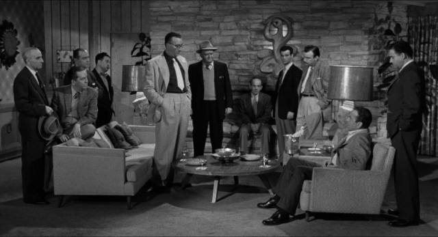 Eddie (Humphrey Bogart) finds himself among the shady characters who run the fight game in Mark Robson's The Harder They Fall (1956)