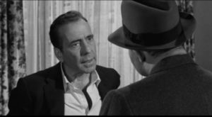 Eddie (Humphrey Bogart) finally stands up to gangster Nick Benko (Rod Steiger)'s threats in Mark Robson's The Harder They Fall (1956)