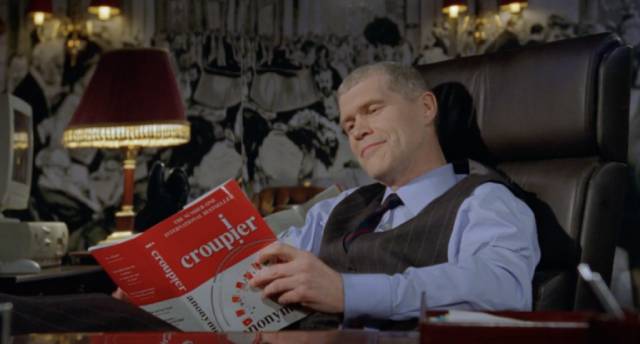 Casino boss David Reynolds (Alexander Morton) has no idea the author of best-selling expose I, Croupier is his own employee Jack (Clive Owen) in Mike Hodges' Croupier (1997)