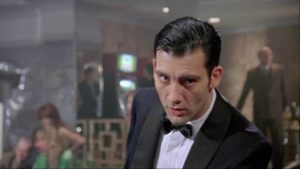 But once hired, Jack (Clive Owen)'s addiction to watching losers kicks in in Mike Hodges' Croupier (1997)