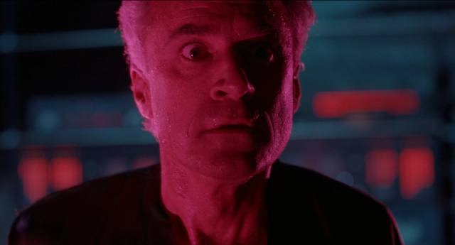 Dr. Edward Pretorius (Ted Sorel) opens a gateway to other dimensions in Stuart Gordon's From Beyond (1986)