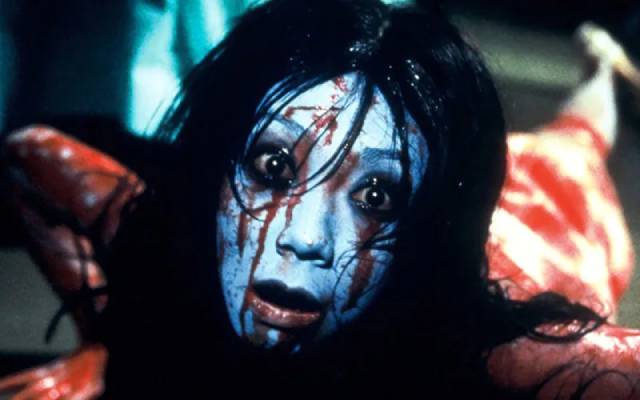 Kayako (Takako Fuji) vents her rage on visitors to the house in Takashi Shimizu's Ju-On: The Grudge 2 (2003)
