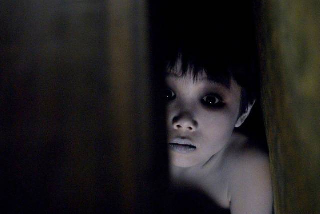 Toshio (Yuya Ozeki) lurks in dark corners in Takashi Shimizu's Ju-On: The Grudge 2 (2003)