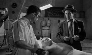 Dr. Santos (Joaquin Cordero) takes control of Santo in Joselito Rodríguez' Santo vs Evil Brain (1961)