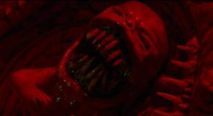 General Hsu (Elvis Tsui)'s unborn children are hungry in Kant Leung’s The Demon’s Baby (1998)