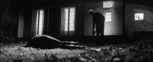 An injured man arrives at the remote house late one night in Mark O'Brien's The Righteous (2021)