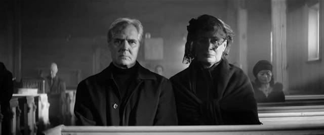 Ex-priest Frederic Mason (Henry Czerny) and his wife Ethel (Mimi Kuzyk) mourn their adopted daughter's death in Mark O'Brien's The Righteous (2021)