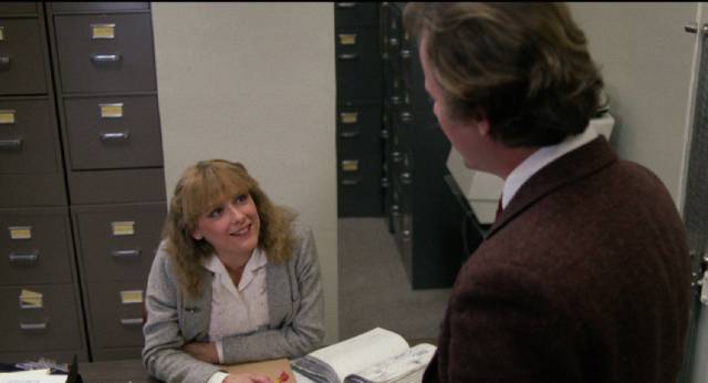Charles (John Heard) meets perky co-worker Laura (Mary Beth Hurt) in Joan Micklin Silver's Chilly Scenes of Winter (1979)