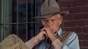 Marshal Frank Patch (Richard Widmark) keeps an eye on a small western town in Death of a Gunfighter (1969)