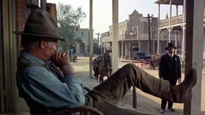 Sheriff Trinidad (John Saxon)walks away from the situation in Death of a Gunfighter (1969)