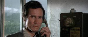 Kidnapper Brescianelli (Henry Silva) sees his plans falling apart in Umberto Lenzi's Free Hand for a Tough Cop (1976)