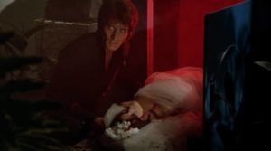 John Harrington (Stephen Forsyth) disposes of Alice Norton (Femi Benussi) in his furnace in Mario Bava's Hatchet for the Honeymoon (1970)