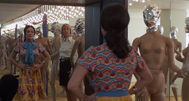 Lise (Elizabeth Taylor) picks out a dress for her vacation trip in Giuseppe Patroni Griffi’s Identikit (1974)