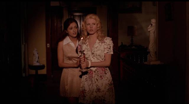 Marta (Lucia Méndez) and Ofelia (Claudia Islas) sense something sinister in the house in Carlos Enrique Taboada’s Darker Than the Night (1975)