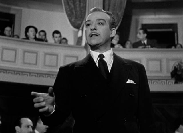 At the trial, Dr. Bernard (Roberto Escalada) demands the death penalty in Román Viñoly Barreto’s El vampiro negro (1953)
