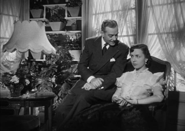 Dr. Bernard (Roberto Escalada) tries to conceal his frustration over the disability his wife (Gloria Castilla) in Román Viñoly Barreto’s El vampiro negro (1953)