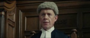 Judge Edward Clarke (Alex Jennings) resents the suggestion that the law might be prejudiced in Steve McQueen's Mangrove (2020)