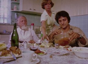 A tense family dinner with Cuda (Lincoln Maazel), his granddaughter Christina (Christine Forrest) and her boyfriend Arthur (Tom Savini) in George A. Romero's Martin (1976)