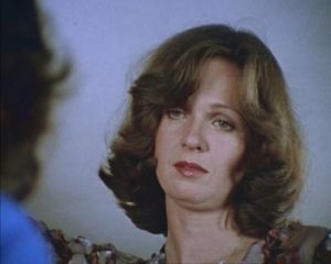 Mrs. Santini (Elyane Nadeau) is drawn to the silent, withdrawn delivery boy in George A Romero's Martin (1976)