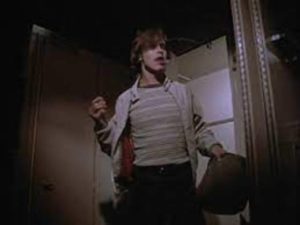 Martin (John Amplas) bursts into the sleeping car in George A. Romero's Martin (1976)