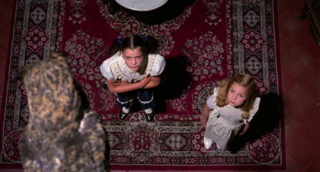 Verónica (Ana Patricia Rojo) introduces Flavia (Elsa María Gutiérrez) to her owl familiar in Carlos Enrique Taboada's Poison for the Fairies (1986)