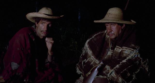 Porfirio (Ignacio López Tarso) and Evodio (Germán Robles) watch the charcoal burners with distrust in Carlos Enrique Taboada’s Rapiña (1975)