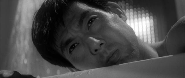 Hanada (Joe Shishido) is unsure what's happening in Seijun Suzuki's Branded to Kill (1967)