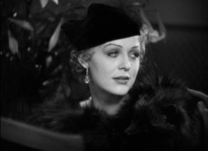 Maria Held (Nancy Carroll) worries that her husband will discover her affair in James Whale's The Kiss Before the Mirror (1933)