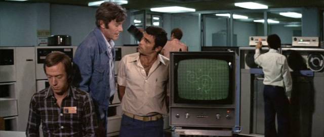 CIA agent Larry Martin (Peter O'Toole) and Israeli agent Yafet Hemlekh (Cliff Gorman) track the kidnappers in Otto Preminger's Rosebud (1975)