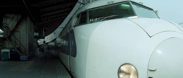 Japan's famous Shinkansen eases oit of Shinjuku station in Jun’ya Satô's The Bullet Train (1975)