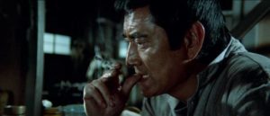 Ruined businessman Tetsuo Okita (Ken Takakura) devises a risky extortion plot in Jun’ya Satô's The Bullet Train (1975)