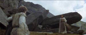 Valerian (Caitlin Clark) gives Galen (Peter MacNichol) a dragon-scale shield in Matthew Robbins' Dragonslayer (1981)