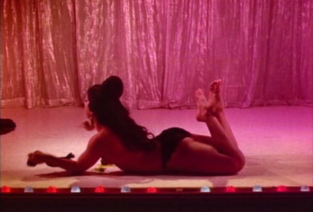Titania (Georgette Dante) headlines the show at the strip-club in Ron Ormond's The Exotic Ones (1968)