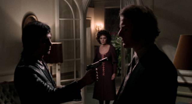 Intruder Quill (Julián Mateos) confronts attorney Peter Bedell (Gianni Garko) in Enzo G. Castellari's Cold Eyes of Fear (1971)