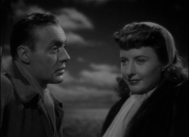 Paul Gaspar (Charles Boyer) encounters Joan Stanley (Barbara Stanwyck), the woman from his vision in Julien Duvivier's Flesh and Fantasy (1943)