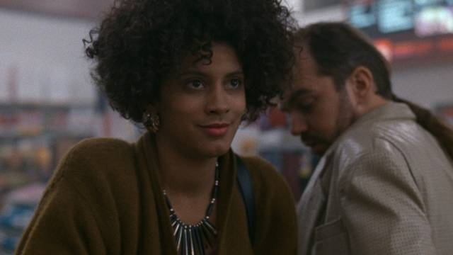 Fantasia (Cynda Williams) tries to deflect attention from Ray (Billy Bob Thornton)'s shifty attitude in Carl Franklin's One False Move (1992)