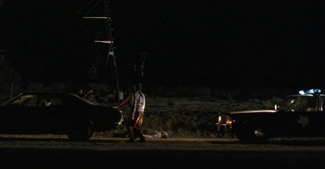 A Texas state trooper pulls over the wrong car in Carl Franklin's One False Move (1992)