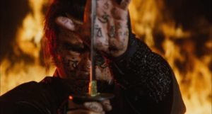 Jubei Yagyu (Sonny Chiba) prepares to face his own dead father (Tomisaburô Wakayama) in a fiery climax to Kenji Fukasaku's Samurai Reincarnation (1981)