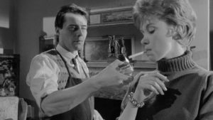 Tony's fiancee Susan (Wendy Craig) distrusts Barrett (Dirk Bogarde)'s motives in Joseph Losey's The Servant (1963)