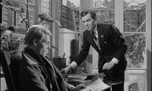 The dynamics of class make Barrett (Dirk Bogarde) all-but-invisible to his employer (James Fox) in Joseph Losey's The Servant (1963)