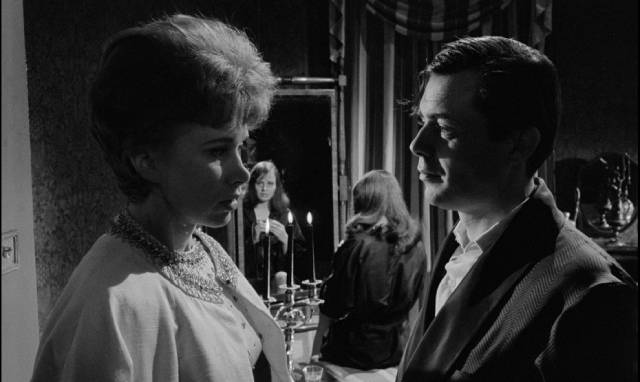 Susan (Wendy Craig) realizes that she has lost the fight with Barrett (Dirk Bogarde) for control of Tony (James Fox) in Joseph Losey's The Servant (1963)