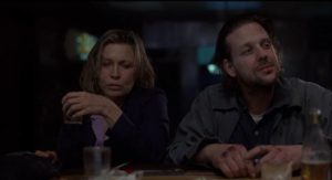 Henry Chinaski (Mickey Rourke) and Wanda Wilcox (Faye Dunaway) discover their mutual love of liquor in Barbet Schroeder's Barfly (1987)