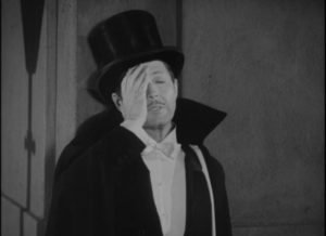 Successful writer Charles Regnier (Carl Esmond) suffers troubling blackouts in Lesley Selander's The Catman of Paris (1946)