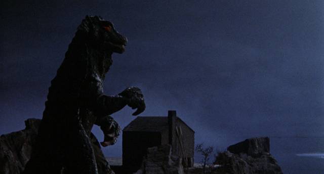 A young monster attacks an Irish village in Eugène Lourié’s Gorgo (1961)