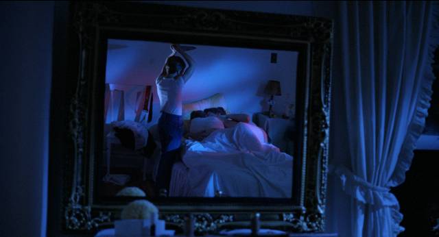 A mirror captures an image of murder in Ulli Lommel's The Boogey Man (1980)