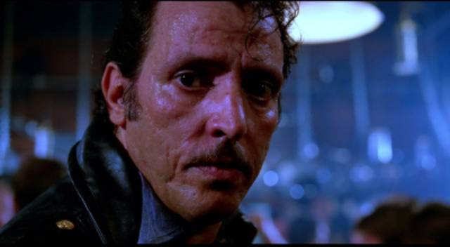 Sleazy cop DiSimone (Joe Spinell) preys on vulnerable members of the gay community in William Friedkin's Cruising (1980)