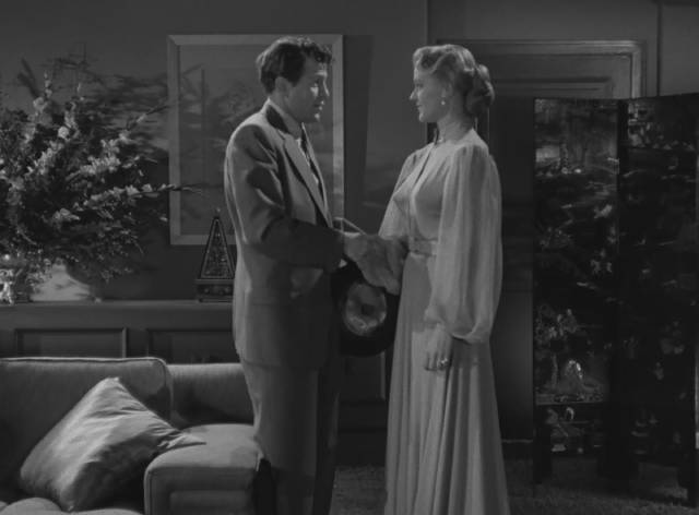 Private eye Mike Hammer (Biff Elliot) meets psychologist Charlotte Manning (Peggie Castle) in Harry Essex's I, the Jury (1953)